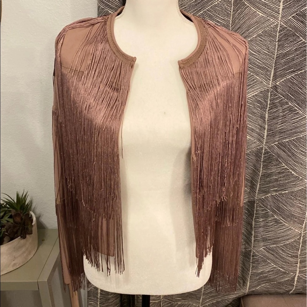 70’s style woman’s fringe jacket